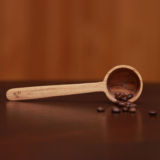 Spring Valley Coffee olive wood coffee scoop with roasted beans